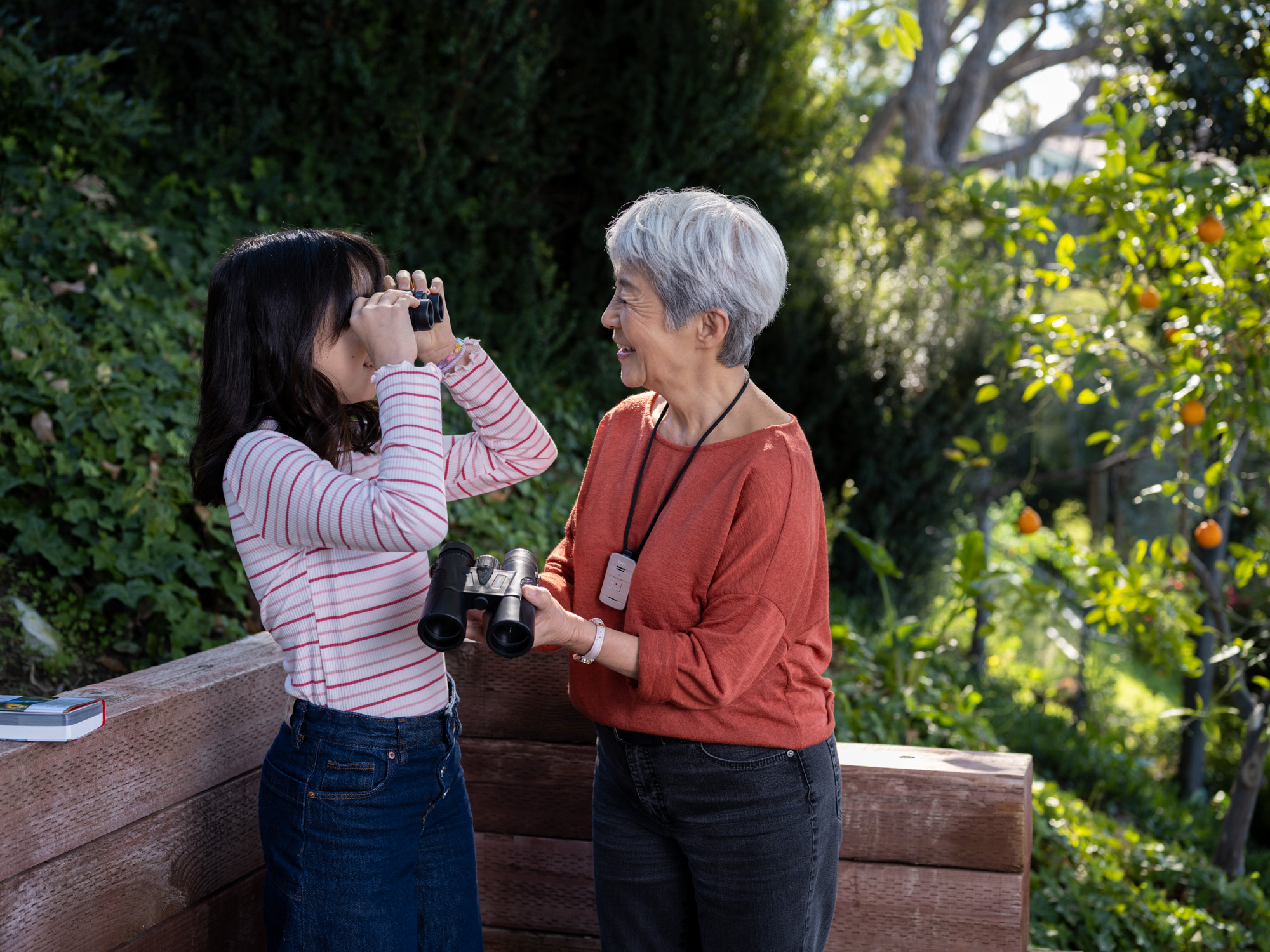 A grandmother and her granddaughter birdwatch in Los Angeles.