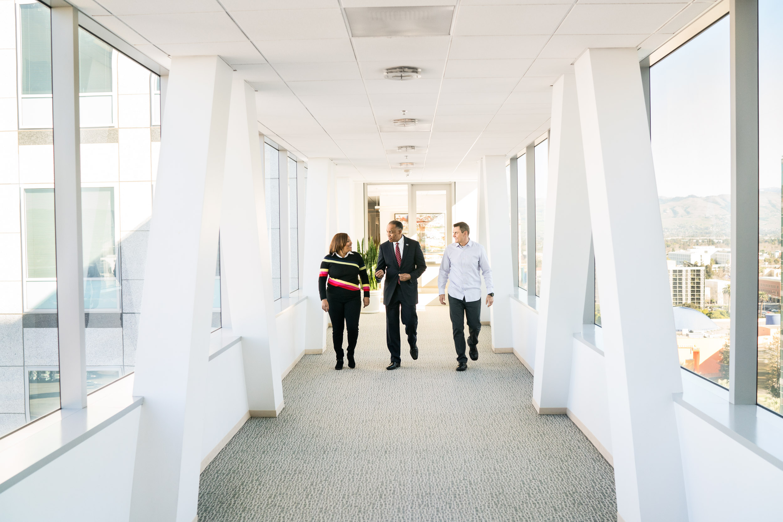 SHRM CEO walking with group in a hallway in the Adobe offices in San Jose, Calif.