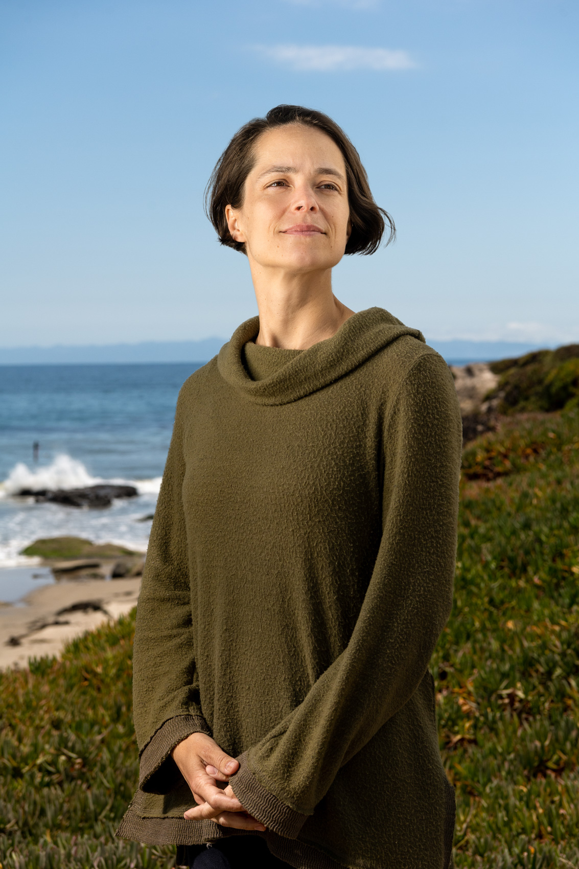 Portrait of female professor at UCSB for Dartmouth College advertisement at Campus Point Beach in Santa Barbara.