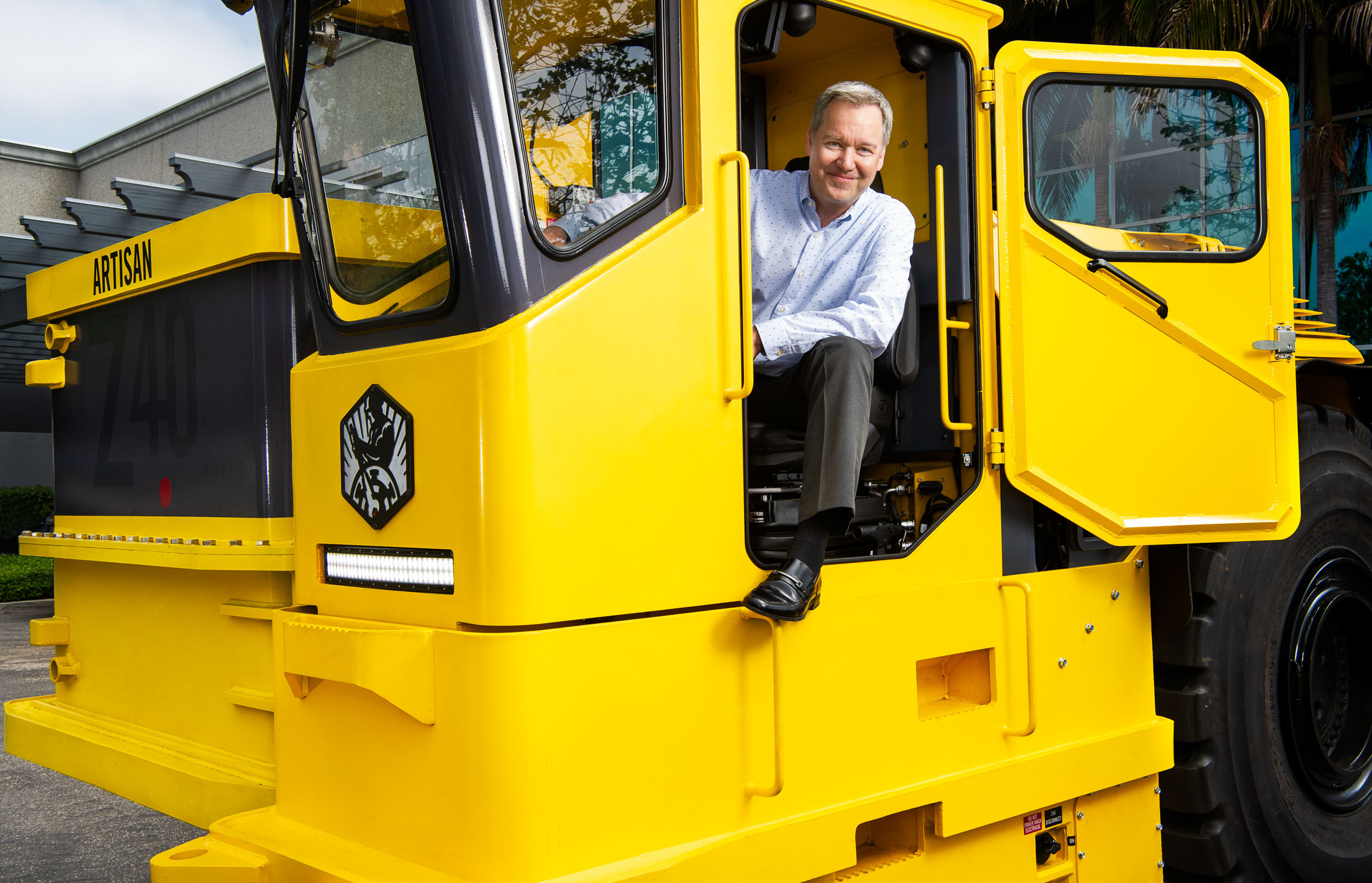 Artisan Vehicles CEO portrait with Sandvik  electric mining truck in Camarillo, Calif. 