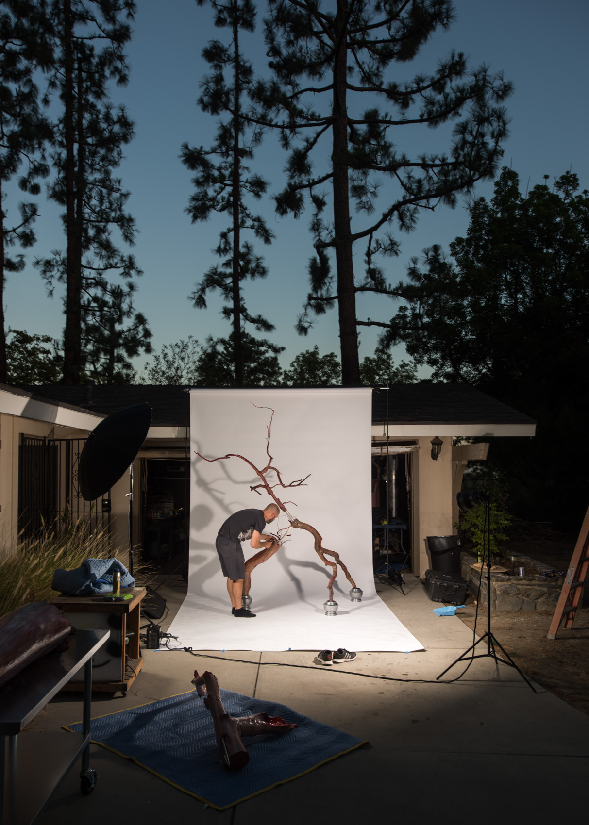 An artist works on a sculpture at his home studio in Pasadena, Calif.