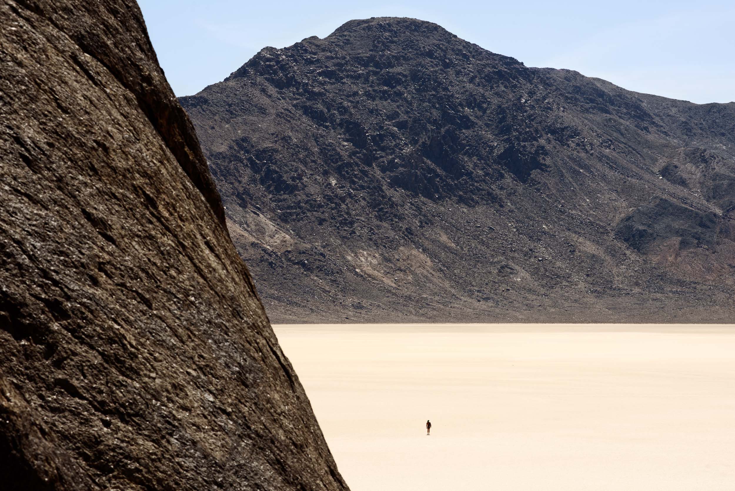 A man walks on the Racetrack Playa in Death Valley National Park.