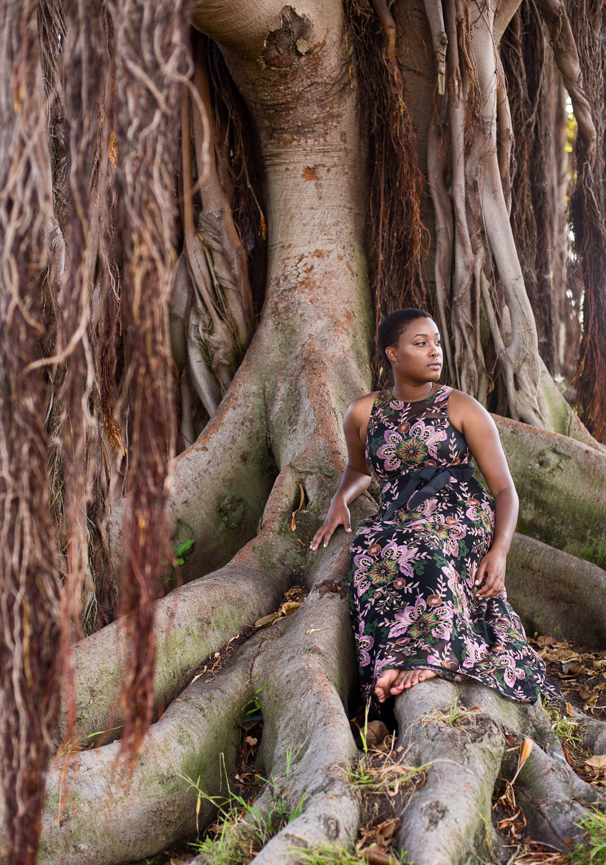 Portrait of a female musician under a large tree in Venice, Calif.