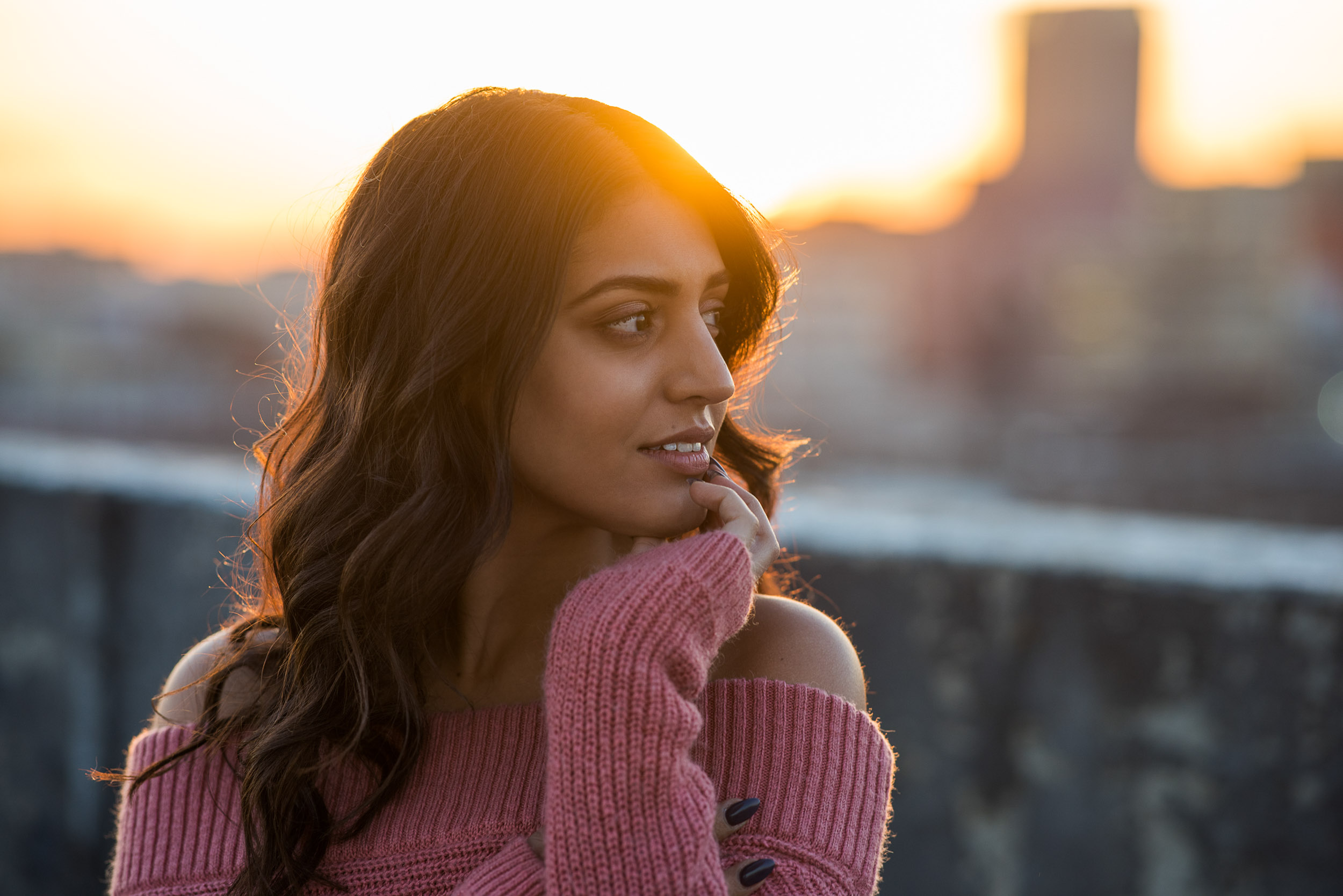 A model poses at sunset in downtown Los Angeles.
