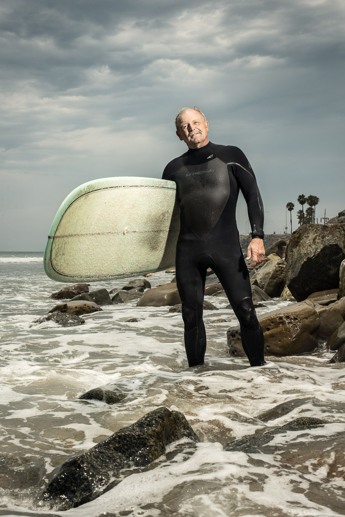 An older surfer portrait in Malibu, Calif.